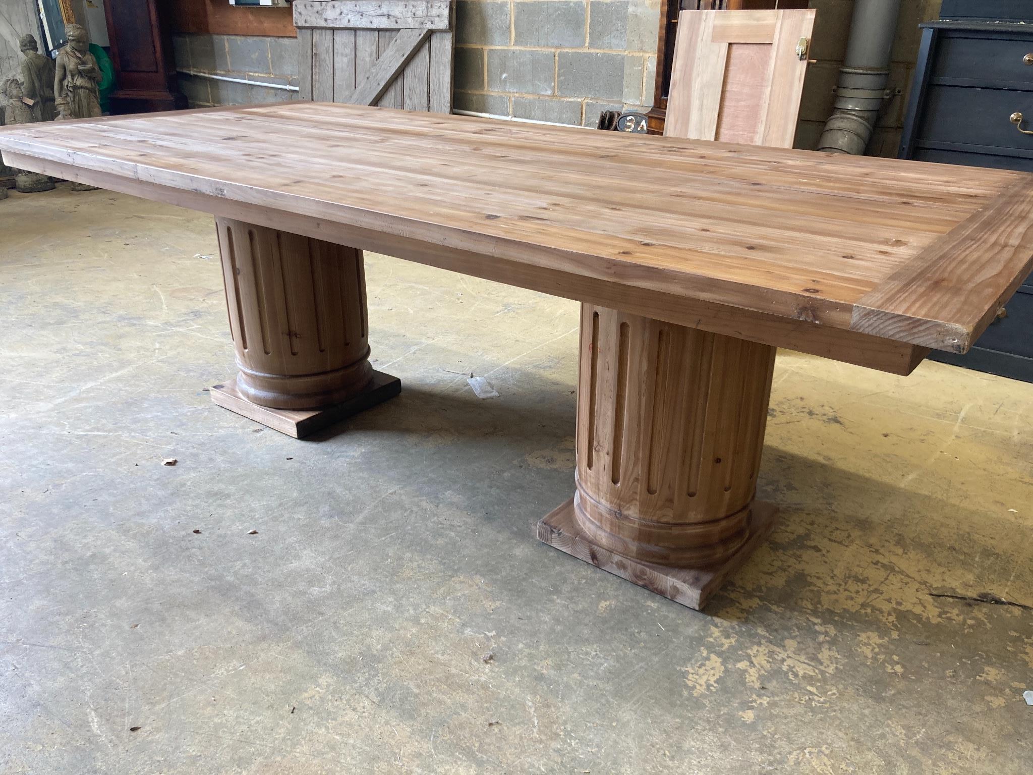 An 18th century style rectangular pine refectory dining table, length 240cm, depth 110cm